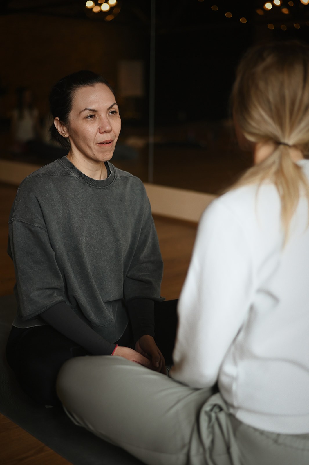 Suzi Curtis in conversation with a client